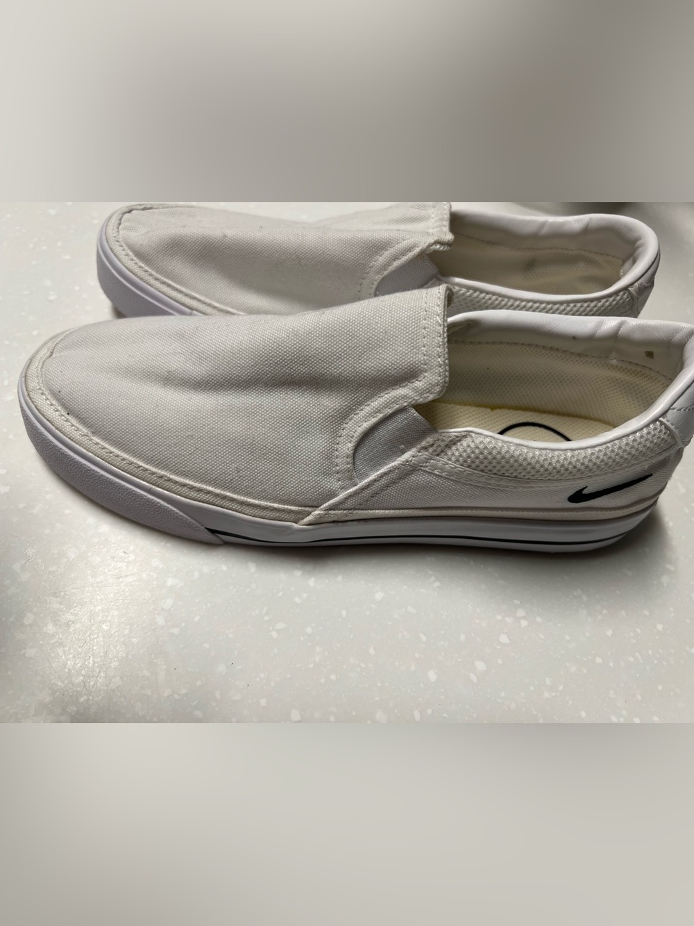 Nike White Canvas Slip-On Loafers with Black Swoosh